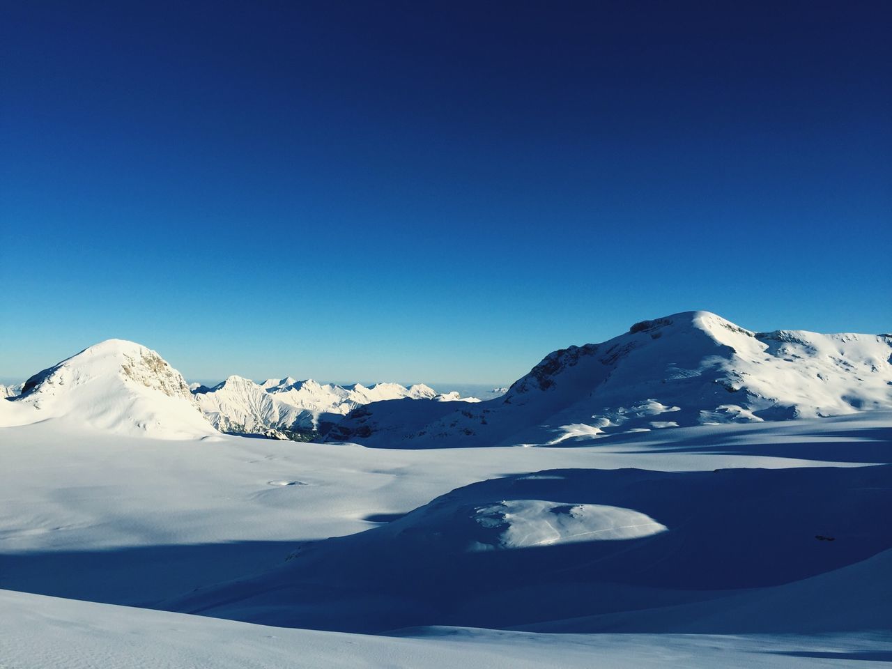 snow, winter, cold temperature, season, snowcapped mountain, mountain, weather, clear sky, tranquil scene, covering, blue, scenics, tranquility, beauty in nature, mountain range, copy space, landscape, nature, white color, frozen