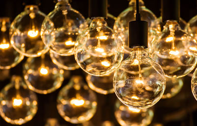 Close-up of illuminated light bulb