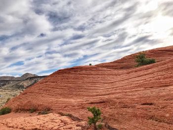 Scenic view of rocky mountains against sky