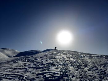 Scenic view of snowcapped mountain against sky