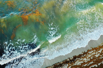 Aerial drone shot of land and sea