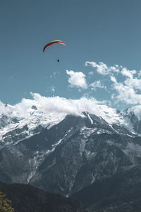 Scenic view of snowcapped mountain against sky