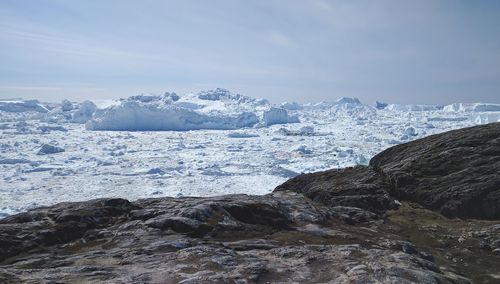 Scenic view of ice covered lake