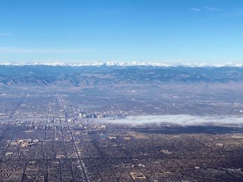 Aerial view of city against sky