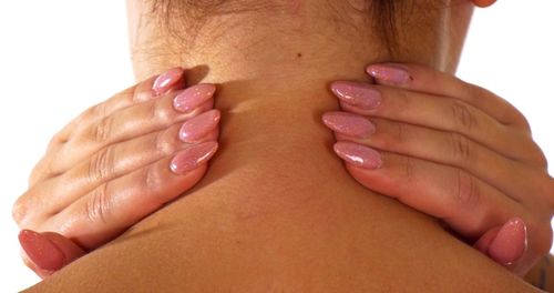 Close-up of woman touching hand