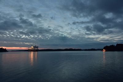 View of calm sea against cloudy sky