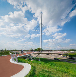 Windmills against sky