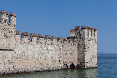 View of fort against clear blue sky