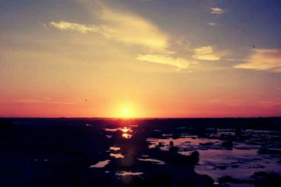 Scenic view of sunset over sea