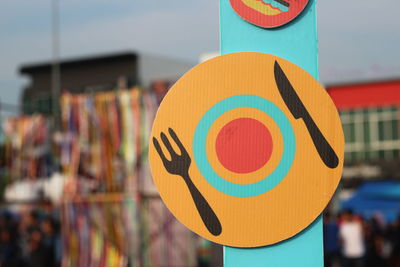 Close-up of multi colored decoration hanging outdoors
