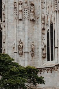Low angle view of statues on building
