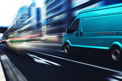 Blurred motion of car on road