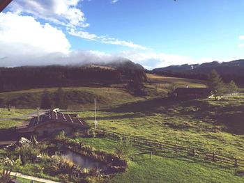 Scenic view of field against sky