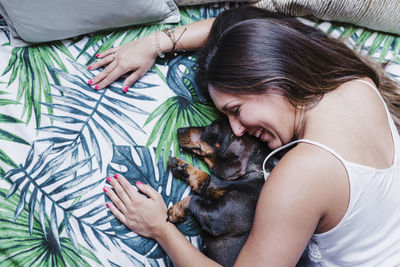 High angle view of woman with dog