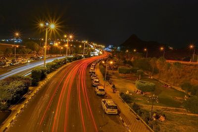 High angle view of light trails on city street