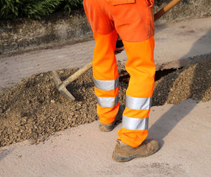 Man working at construction site in city