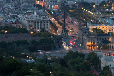 High angle view of city buildings at night