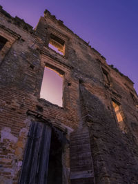 Low angle view of historical building against clear sky