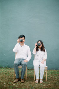 Full length of young man standing outdoors