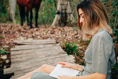 Woman sitting on bench