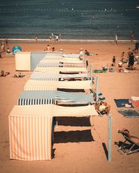 High angle view of chairs on beach