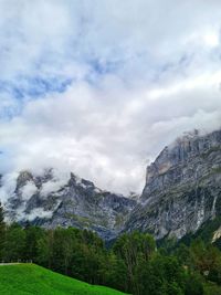 View of mountain range against cloudy sky