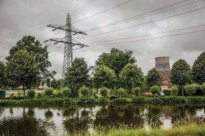 Canal and nuclear power plant near geertruidenberg. a small village in the netherlands countryside.