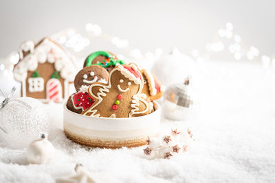 Close-up of christmas decorations on snow