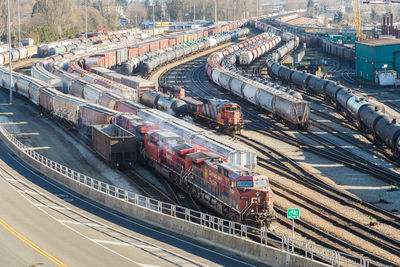 High angle view of train at railroad tracks in city