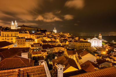 View over the historic alfama district in lisbon, portugal, at night