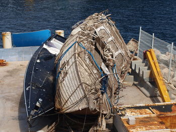 High angle view of fishing boats moored at shore