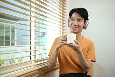 Young woman using mobile phone