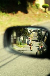 Man with bicycle on street