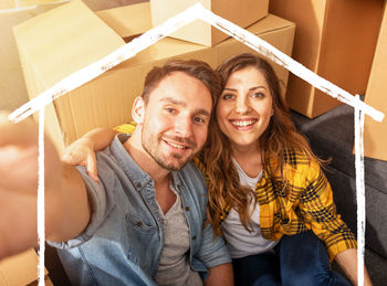 Portrait of smiling young couple