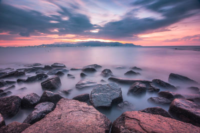 Scenic view of sea against sky during sunset