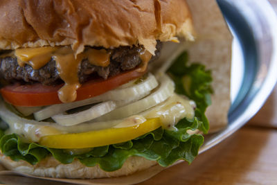 Close-up of burger in plate on table