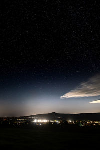 Aerial view of illuminated cityscape at night