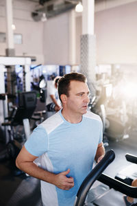 Man exercising at gym