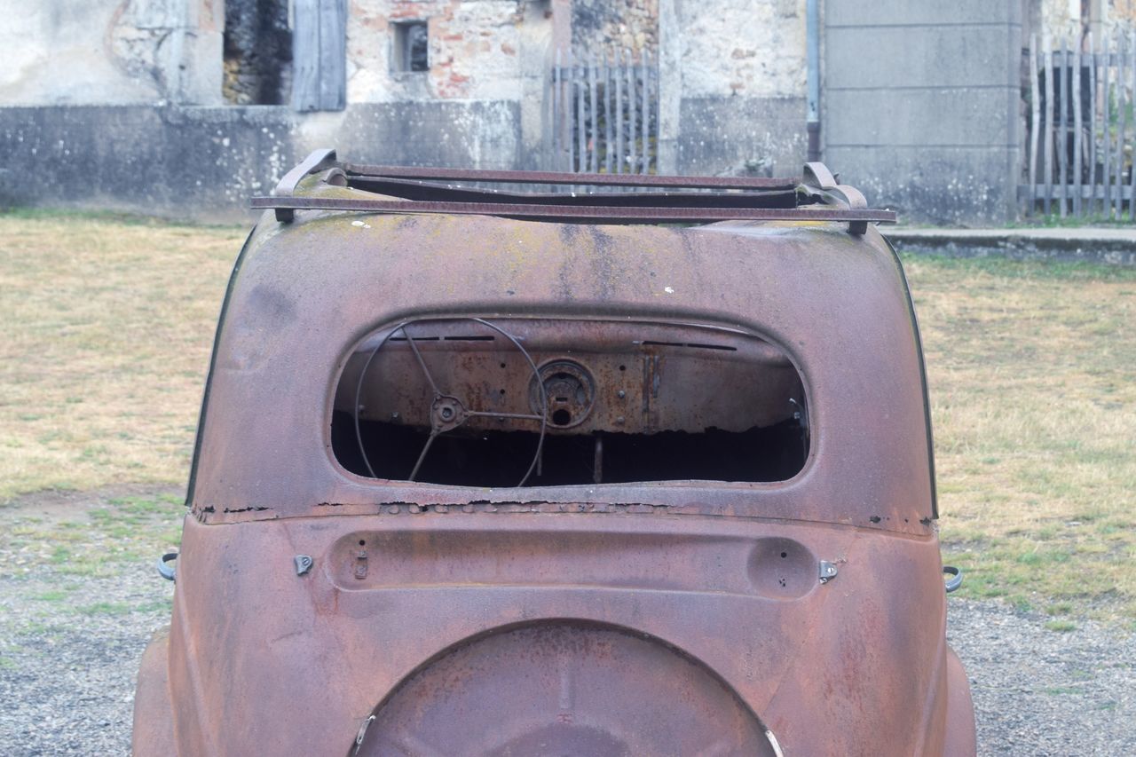 CLOSE-UP OF ABANDONED BUS