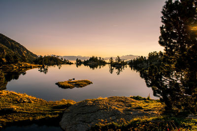 Sunrise lake in the spanish pyrenees, located at mountain hut jm blanc, aigüestortes