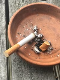 High angle view of cigarette on table