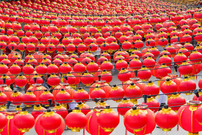 Full frame shot of red lanterns hanging in row