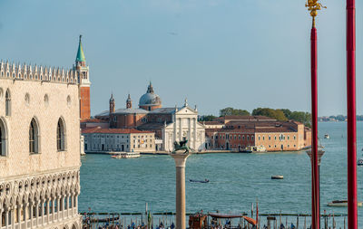 View of buildings against blue sky