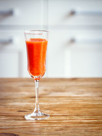 Close-up of wineglass on table