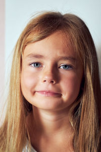 Close-up portrait of innocent girl with long hair