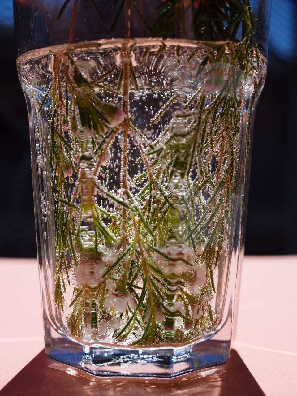 CLOSE-UP OF BEER IN JAR ON TABLE