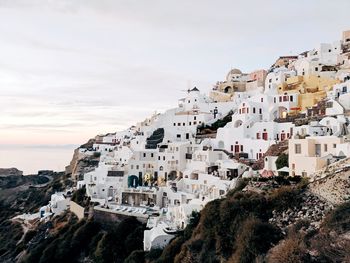 View of buildings against cloudy sky