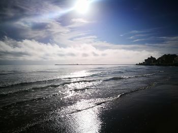 View of sea against cloudy sky