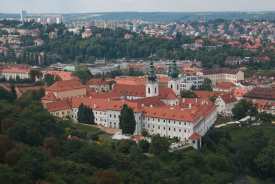 High angle view of townscape and trees in city