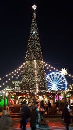 Low angle view of illuminated ferris wheel